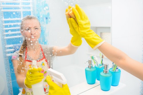 Deep cleaning kitchen and bathroom areas during a tenancy handover in Bromley